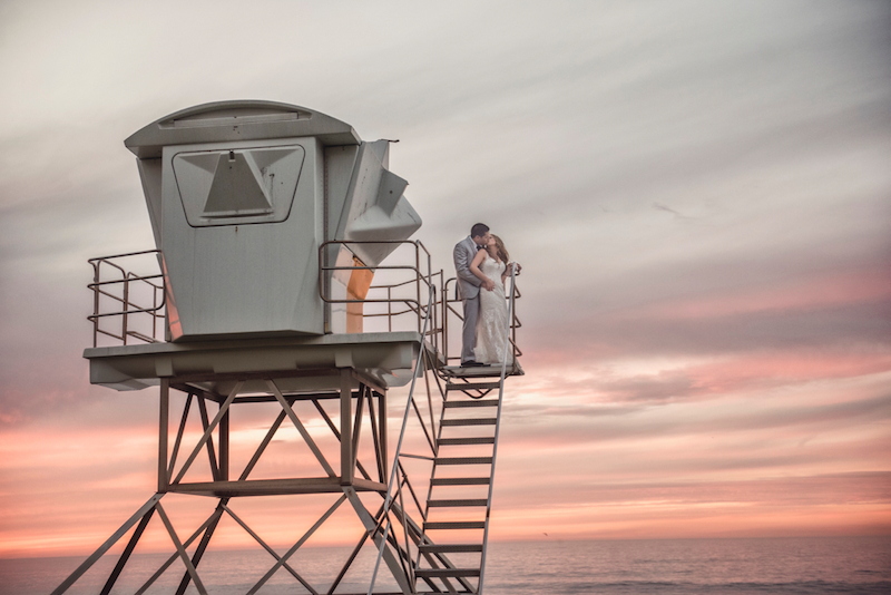 real wedding, bride and groom, sunset, lifeguard tower