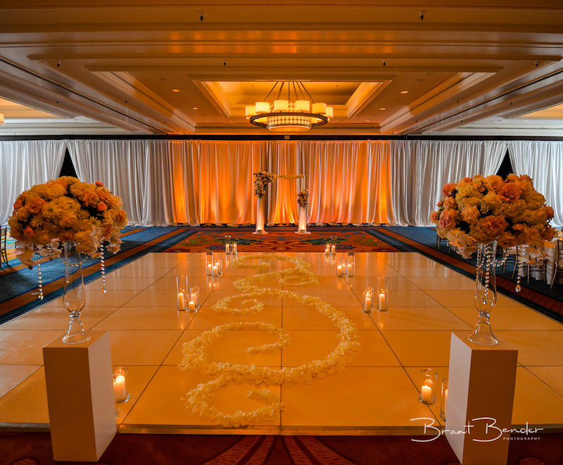 wedding ceremony site, flower lined aisle