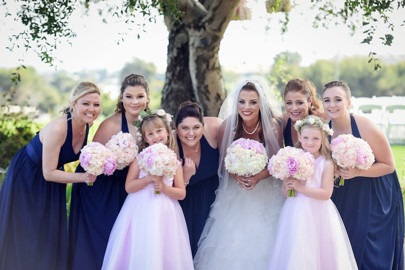 Bride, bridesmaids, flower girls, bouquets