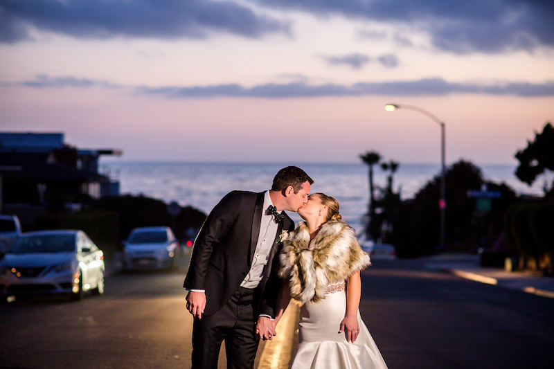 bride and groom in the middle of the street, sunset