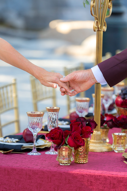 bride and groom holding hands, tablescape