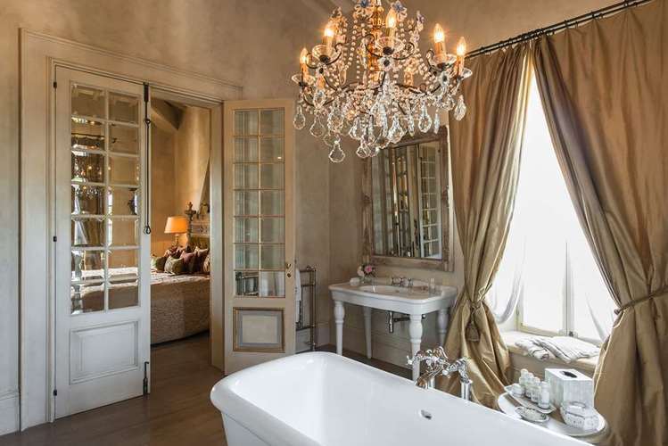 bathtub, chandelier