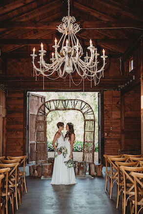 ss wedding, two brides, chandelier