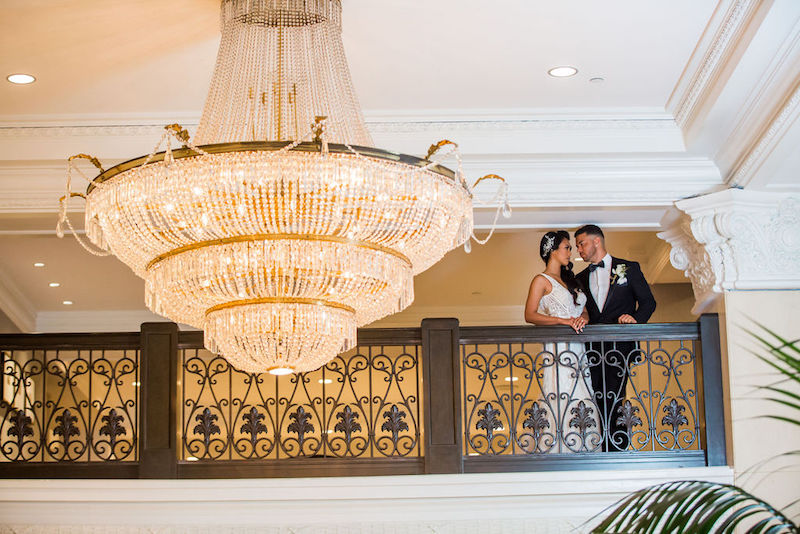 chandelier, bride and groom