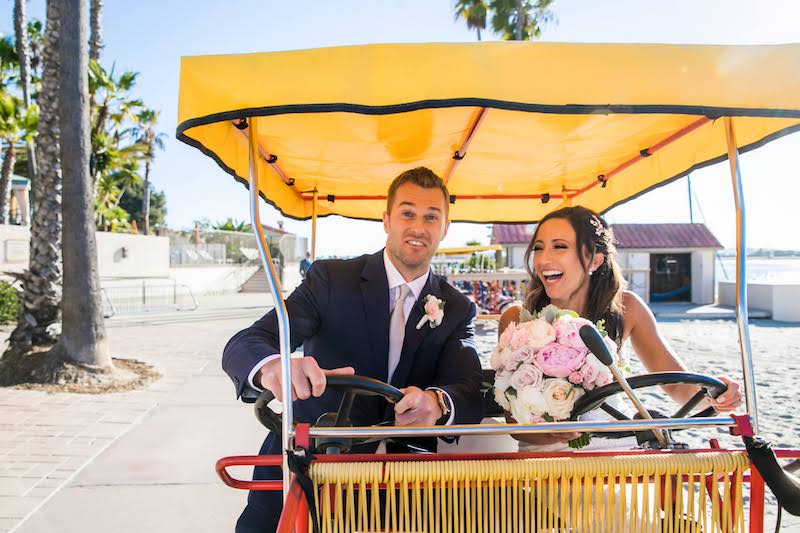 bride and groom in beach buggy