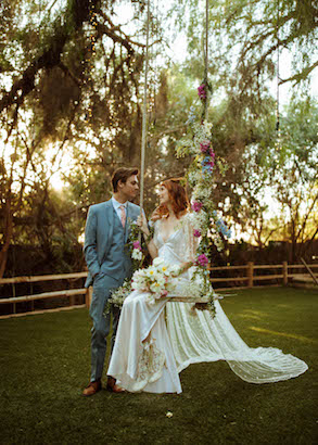 bride on swing with groom